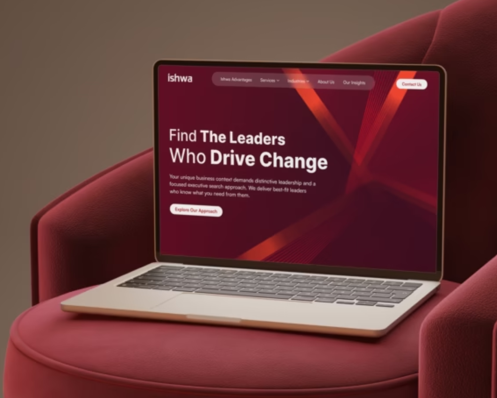 Laptop displaying business website on couch